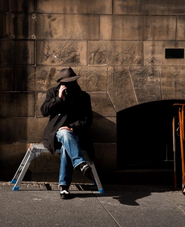 Man initiating a phishing call, social engineering